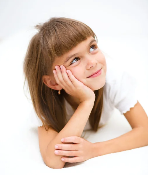Little girl is daydreaming — Stock Photo, Image