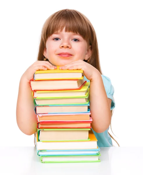 Cute girl is reading book — Stock Photo, Image