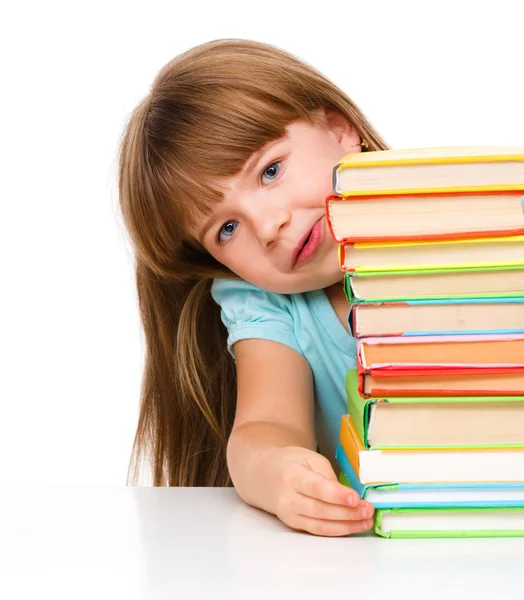 Cute girl is reading book — Stock Photo, Image