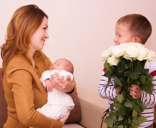 Mother holds child