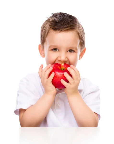 Lindo chico con manzanas rojas — Foto de Stock