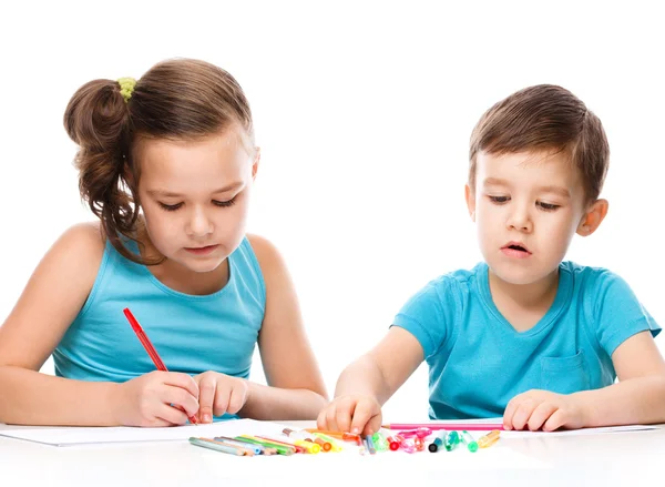 Cute children is drawing on white paper — Stock Photo, Image