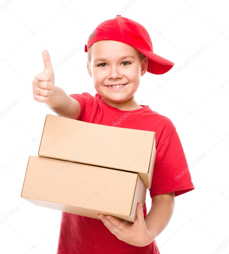Happy girl holding cardboard boxes