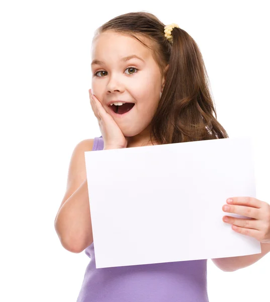 Girl is holding blank banner — Stock Photo, Image