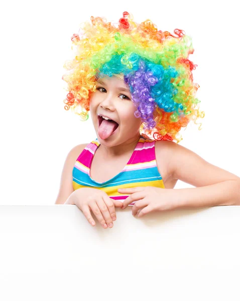 Ragazza in clown è in possesso di banner vuoto — Foto Stock