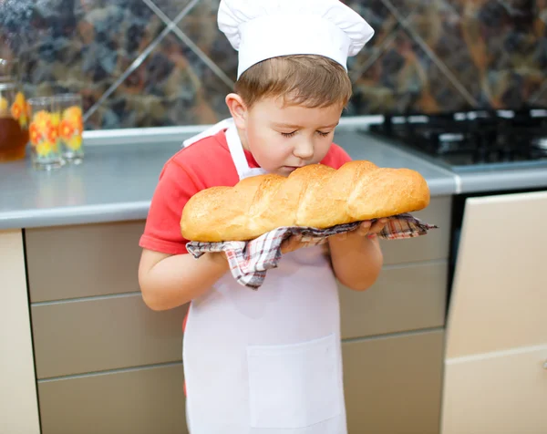 Boy making bread — Stock Photo, Image