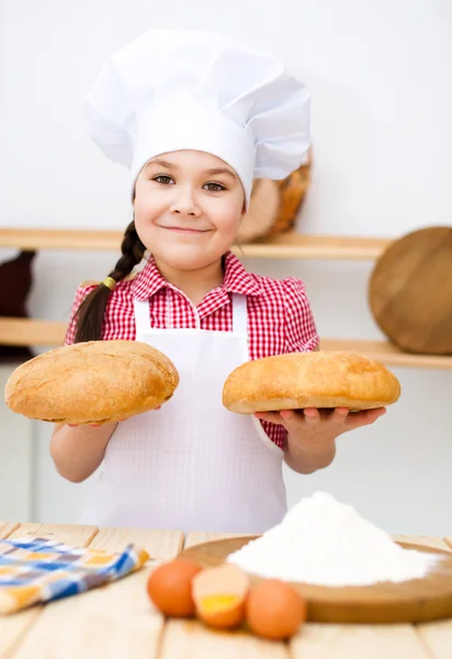 Girl making bread — Stock Photo, Image