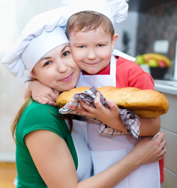 Mother with son making bread — Stock Photo, Image