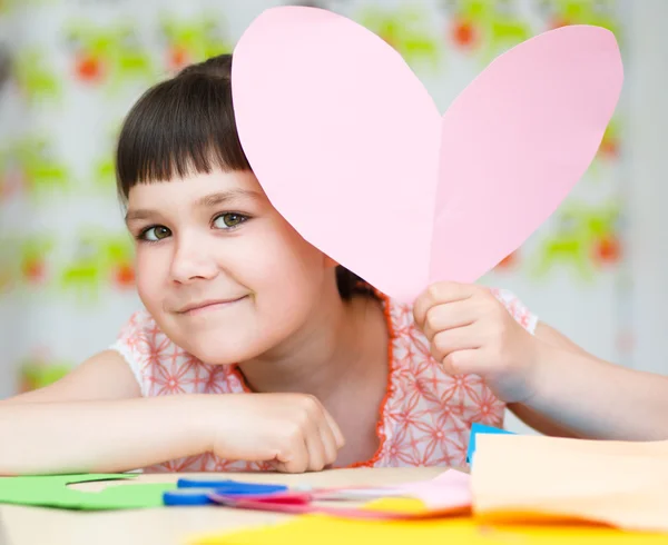 Happiness - smiling girl with pink heart — Stock Photo, Image