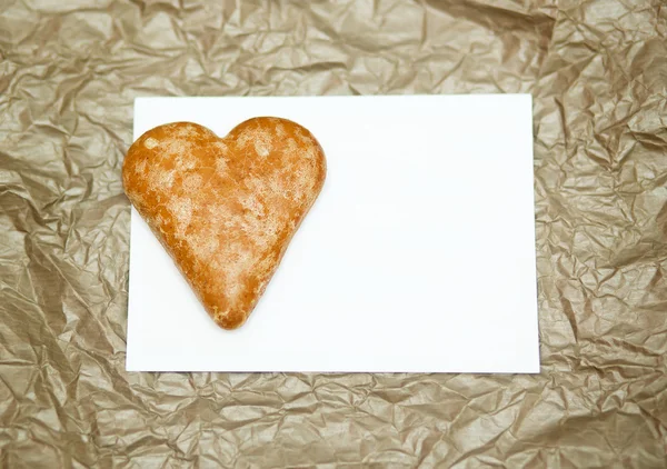 Cookies in the form of heart on a paper background — Stock Photo, Image