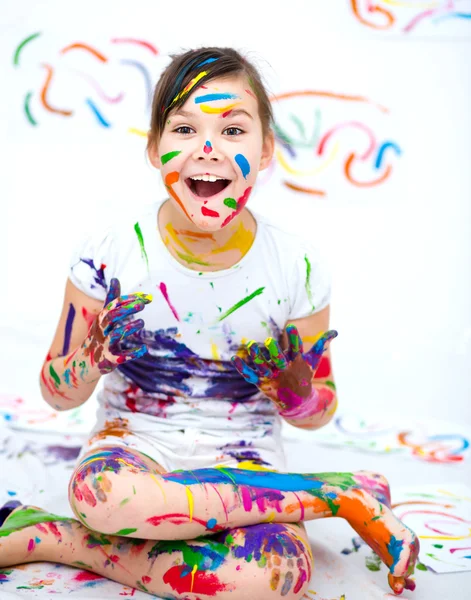 Cute girl playing with paints — Stock Photo, Image