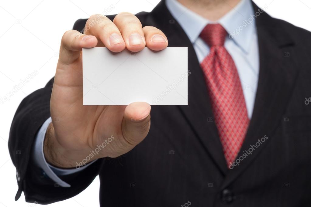 Hand In A Business Suit Showing Business Card