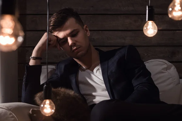 Thoughtful Handsome Man In Suit