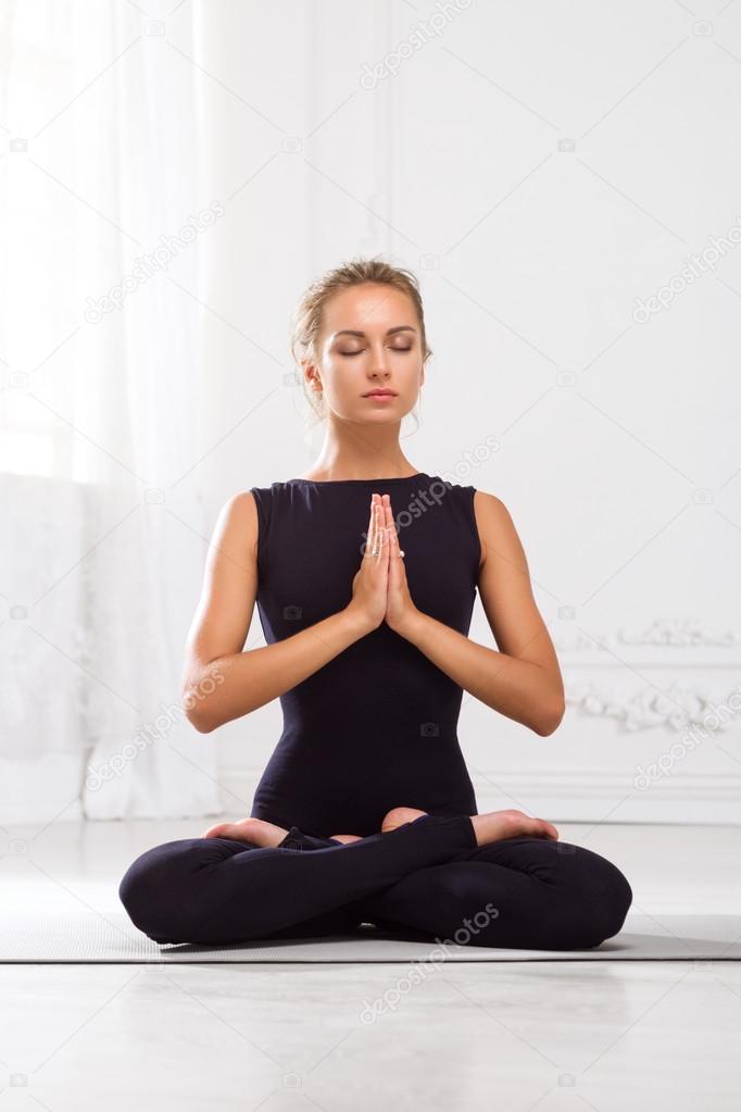 Beautiful Girl Doing Yoga Exercises