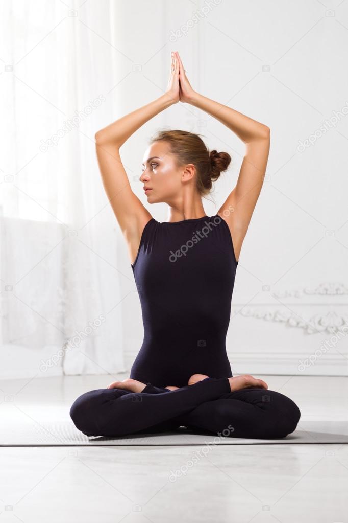 Beautiful Girl Doing Yoga Exercises