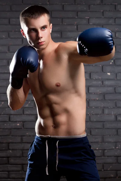 Boxer Striking A Blow — Stock Photo, Image