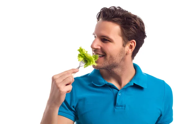 Uomo con insalata isolata su sfondo bianco — Foto Stock