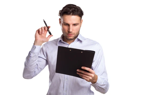 Nadenkend jonge zakenman Holding een Tablet en Pen — Stockfoto