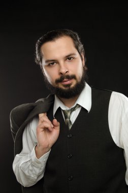 kostüm üçlü bir siyah arka plan üzerine bir sakallı şeytani yakışıklı adam