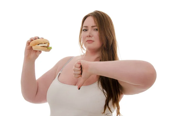 şişman kadın beyaz arka plan üzerinde izole hamburger yemek