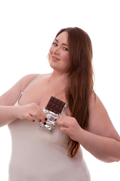 Mujer gorda con chocolate en las manos aisladas sobre fondo blanco — Foto de Stock