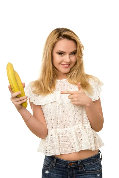 年轻漂亮的女孩，用香蕉在白色背景上孤立的手 — 图库照片
