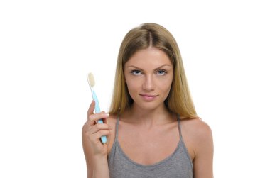 Diş fırçası ve diş macunu ile genç güzel kız