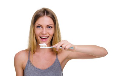 Diş fırçası ve diş macunu ile genç güzel kız