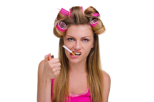 Menina bonita nos rolos com um cigarro — Fotografia de Stock