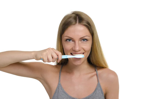 Young beautiful girl with toothbrush and toothpaste Stock Photo