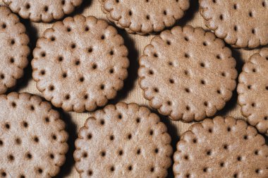 Çikolata kremalı kurabiyelerin doku arka planı.