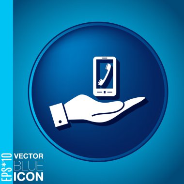 El ele tutuşan akıllı telefon.