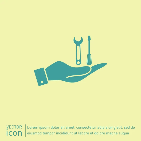 Hand som håller skruvmejsel och skiftnyckel ikonen — Stock vektor