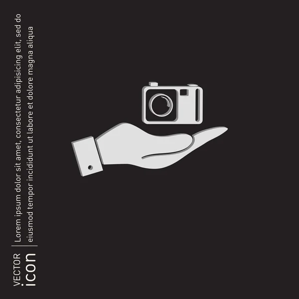 Hand holding   photo camera — Stock Vector