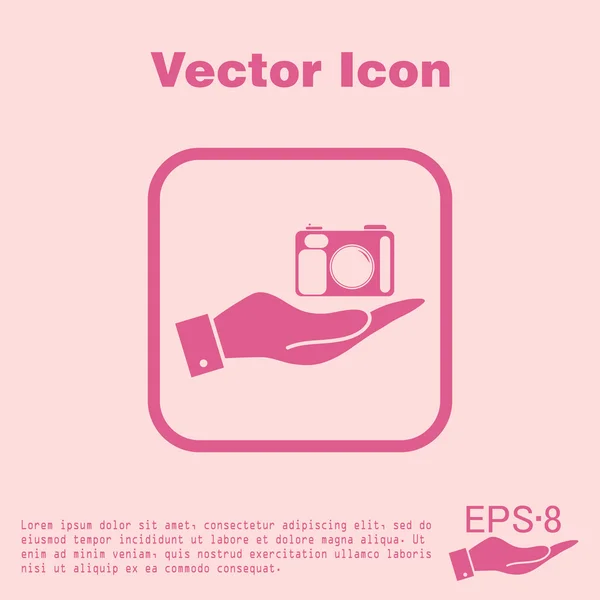 Ruka držící ikona kamery Foto — Stockový vektor