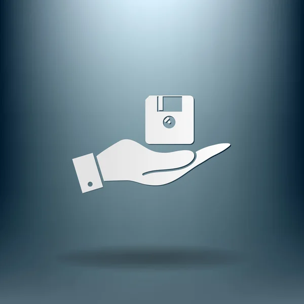 Ręka trzyma ikonę dyskietki — Wektor stockowy