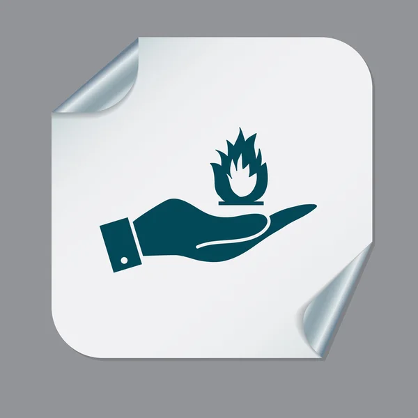 Handen håller en brandskylt. — Stock vektor