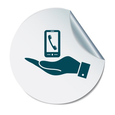 Akıllı telefonu tutan el.