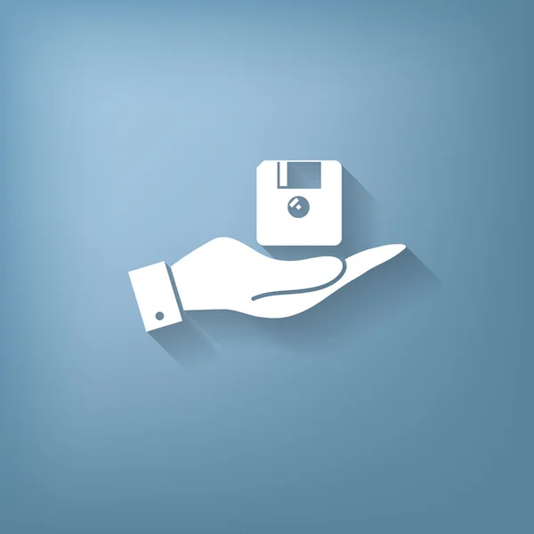 Hand holding a floppy, diskette — Stock Vector