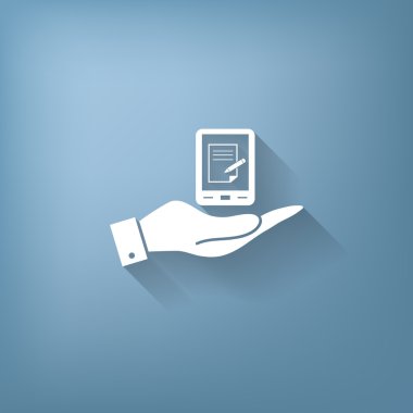 bir tablet pad tutan el