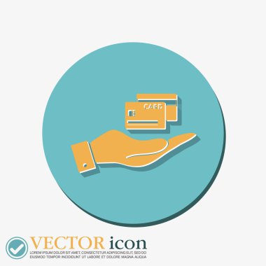 Bir kredi kartı tutuyor.