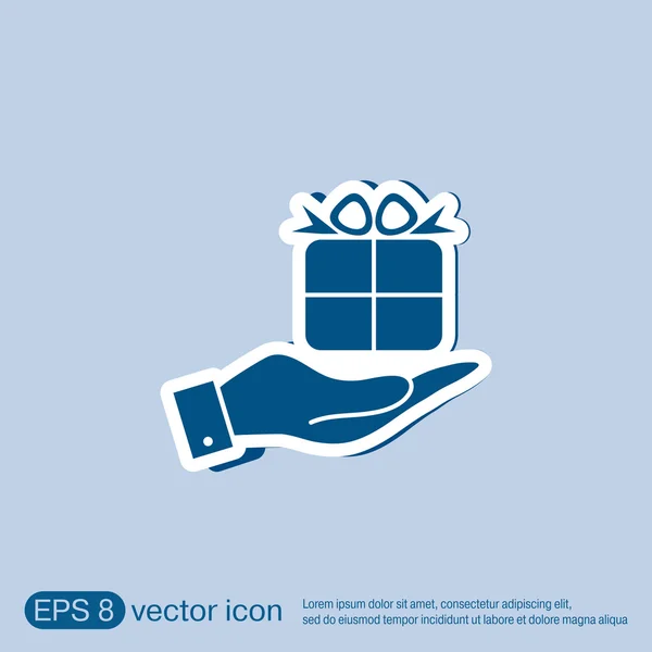Ruka držící krabice vánoční dárek — Stockový vektor