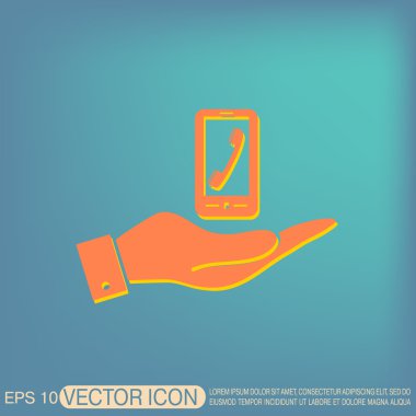 El ele tutuşan akıllı telefon.