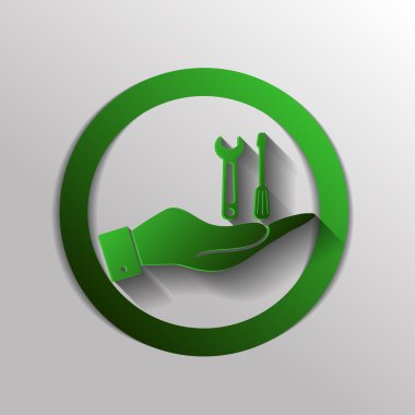 bir tornavida ve anahtarı tutan el