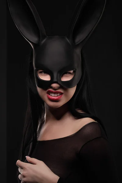 Sexy, beautiful, charming, woamn in black rabbit mask and elegant dress. — Stock Photo, Image