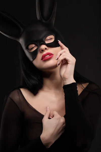 Sexy, beautiful, charming, woamn in black rabbit mask and elegant dress. — Stock Photo, Image