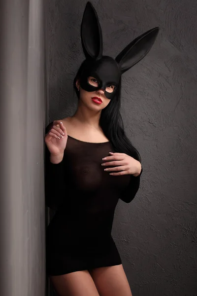 Sexy, beautiful, charming, woamn in black rabbit mask and elegant dress. — Stock Photo, Image