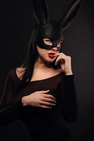 Sexy, beautiful, charming, woamn in black rabbit mask and elegant dress. — Stock Photo, Image