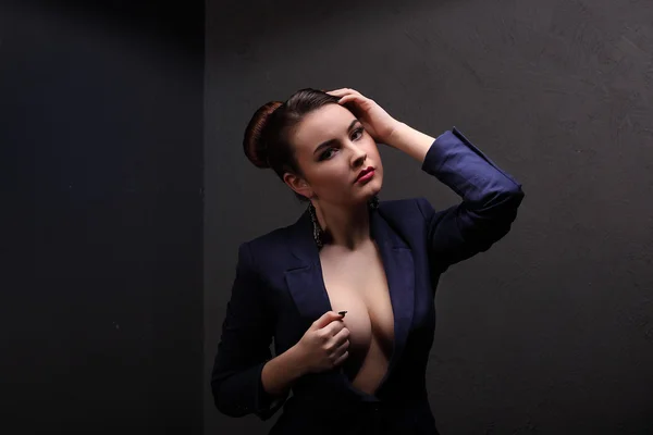 Beautiful girl with sexy breasts in jacket and beauty hair — Stock Photo, Image