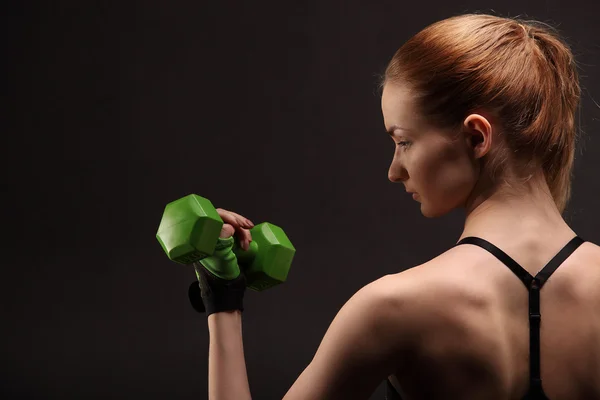 Athletic young woman doing a fitness workout with weights. Fitness girl — Stock Photo, Image